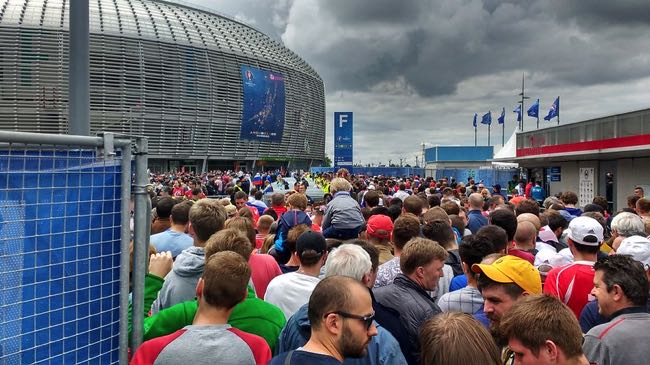 Crowds outside a group stage tournament
